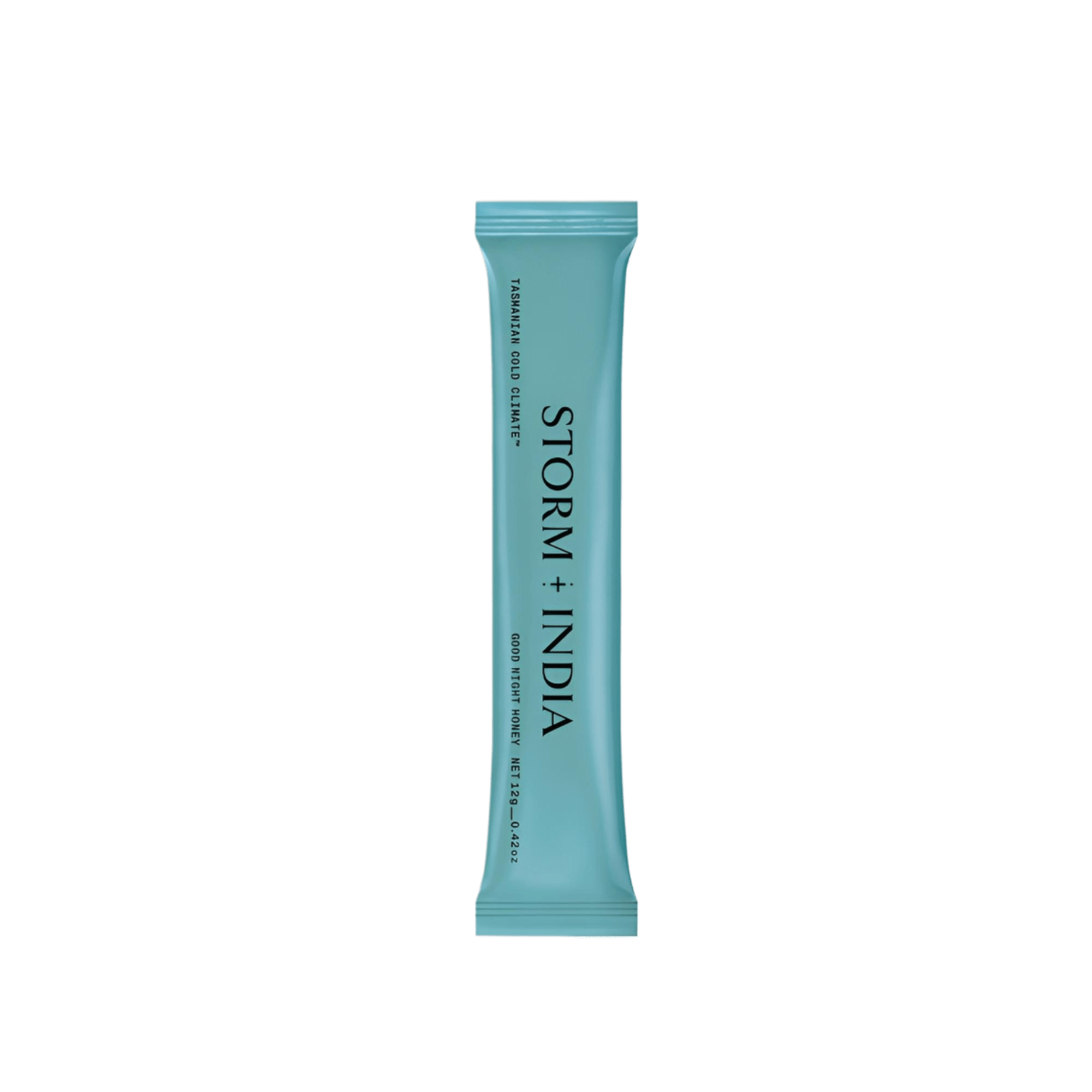 A turquoise single-serve sachet labeled JING Organics with Storm + India Good Night Honey and additional text in black on a plain white background.